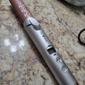 NOVIIML 2-in-1 Hair Straightener and Curler. 